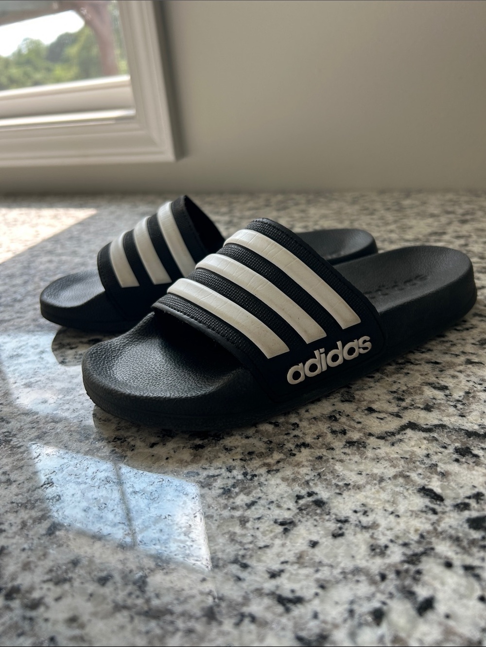 adidas Black and White Kids Slide Sandals with Three Stripes